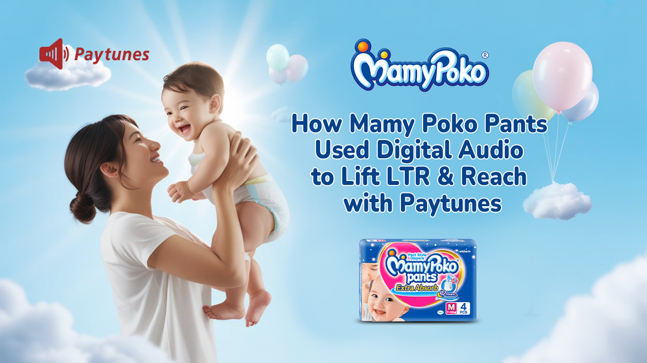 Mamy Poko Pants Paytunes festive digital audio campaign banner with mother lifting baby and headline about lifting LTR and reach.